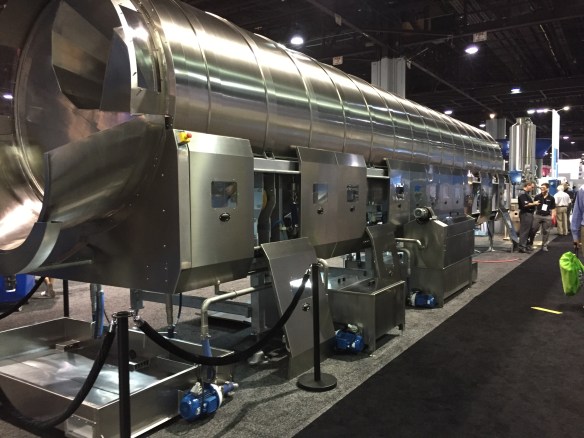 A massive, cylindrical washing machine